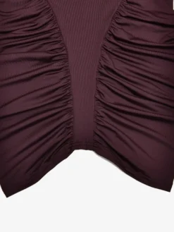Robe mini moulante dos nu à col montant froncé style moderne collection femme 2026