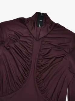 Robe mini moulante dos nu à col montant froncé style moderne collection femme 2026