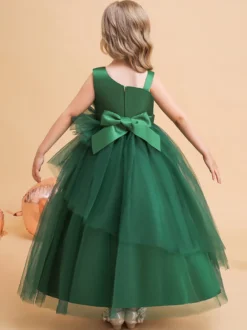 Robes de demoiselle d'honneur vertes de Noël en tulle sans manches avec décolleté conçu