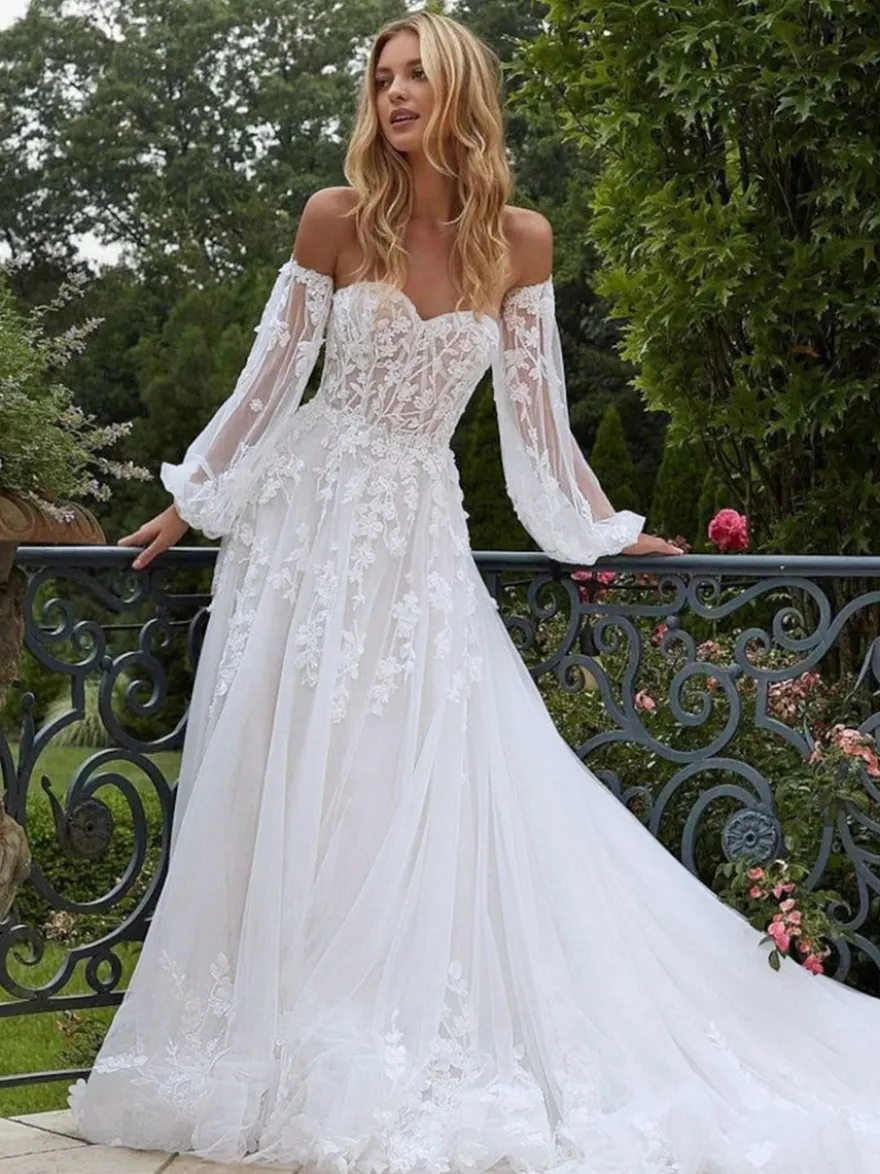 Robes de mariée bustier en dentelle manches amovibles et traîne
