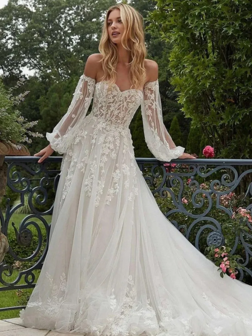 Robes de mariée bustier en dentelle manches amovibles et traîne