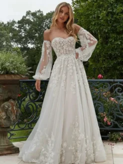 Robes de mariée bustier en dentelle manches amovibles et traîne