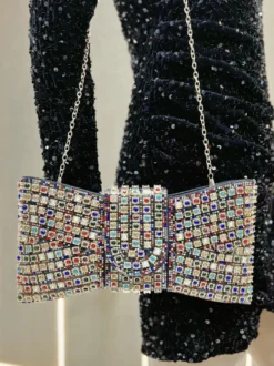 Sac bandoulière de soirée oversize à nœud et strass étui rigide pochette de soirée avec bandoulière chaîne.
