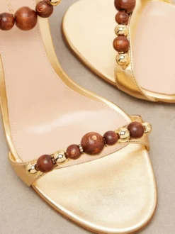 Sandales à talons hauts dorées pour femmes bout ouvert lacets et perles