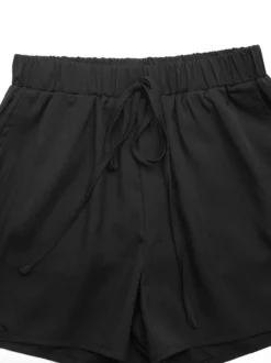 Short de plage décontracté pour femme taille élastique à cordon bordure en dentelle sur les côtés.