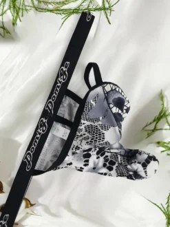 String pour homme en dentelle florale argentée avec poche en maille transparente et sous-vêtement sexy et élastique