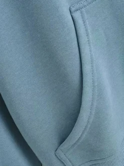 Sweat à capuche zippé à cordon de serrage manches longues coupe ample style décontracté pour femme