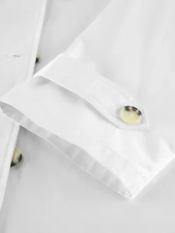 Trench-coat femme en mélange de coton - Coupe oversize minimaliste à double boutonnage et manches larges - Collection printemps-été 2026