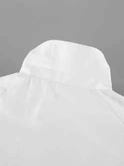 Trench-coat femme en mélange de coton - Coupe oversize minimaliste à double boutonnage et manches larges - Collection printemps-été 2026