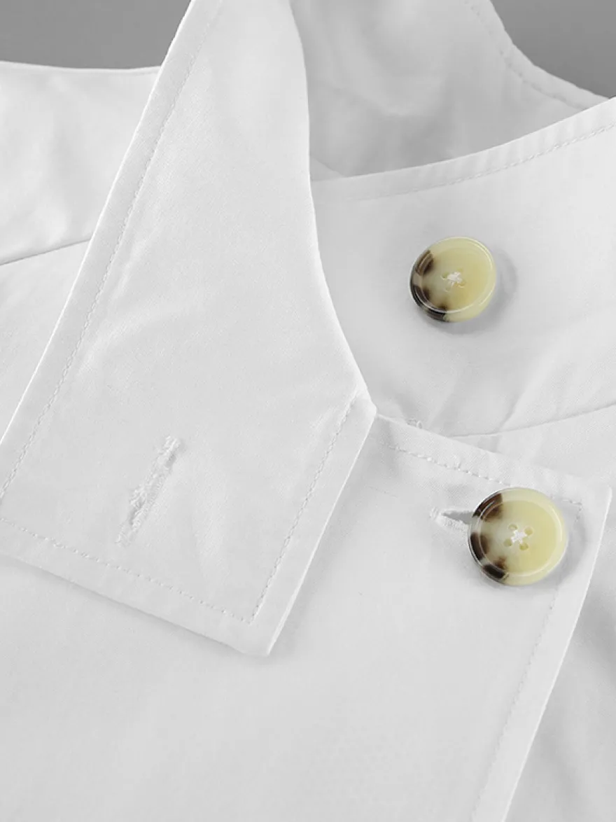 Trench-coat femme en mélange de coton - Coupe oversize minimaliste à double boutonnage et manches larges - Collection printemps-été 2026