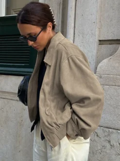 Veste bomber courte décontractée en faux daim pour femme col à revers zippé ourlet côtelé élastique.
