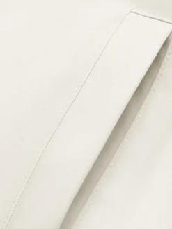 Veste courte à col revers pour femme coupe ample épaules tombantes ourlet élastique fermeture éclair