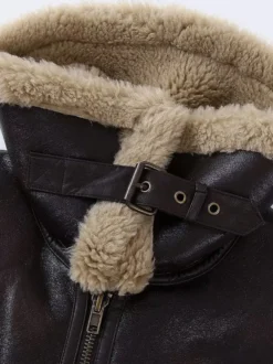 Veste de motard courte doublée en fausse fourrure marron col large et duveteux poignets zippés