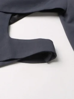 Veste de tailleur à bretelles croisées et découpes dos torsadé et ourlet asymétrique